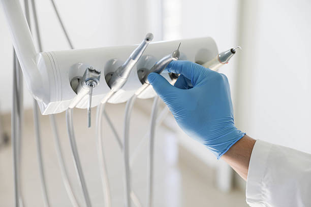 Professional Tooth Extraction technician working in Russell, PA